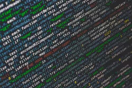 A stock image of generic, minified JavaScript code